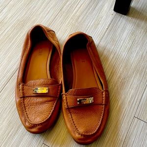 Brown coach flats